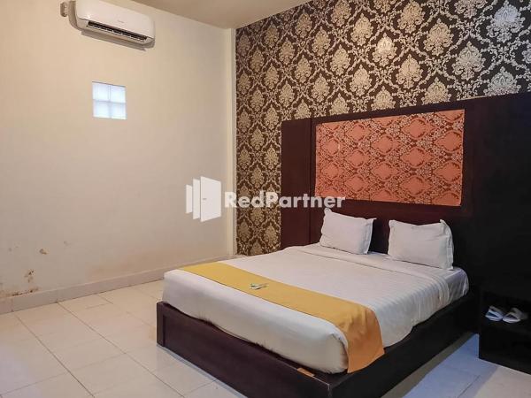 Hotel Puri Yasmin Potowanua Lasusua Mitra RedDoorz, Rezervați Hotel Hoteluri în Sulawesi cu parcare, Parcare