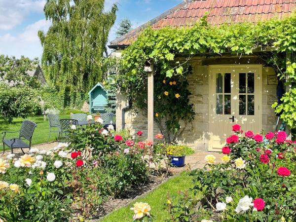 Le Jardin, Rezervați Casă de vacanță Rodmarton Glasgow