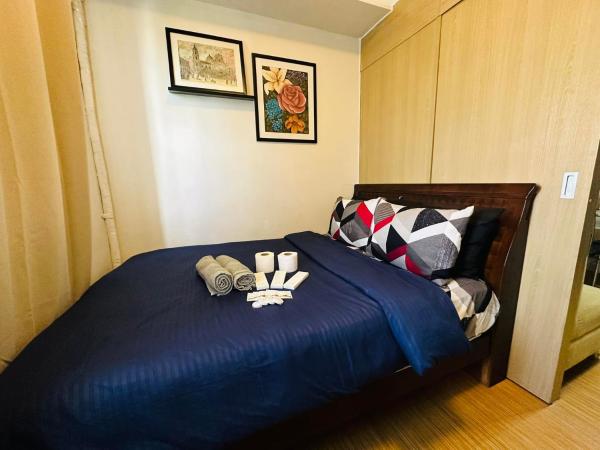 1 Bedroom with balcony Near Airport Bgc Taguig City, Rezervați  Hoteluri în Luzon cu piscină, Piscină