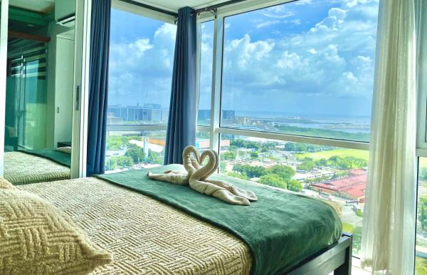 Stunning view staycation near MOA PICC WORLD TRADE CENTER AIRPORT LUNETA PARK MANILA OCEAN PARK QURINO GRANDSTAND, Rezervați  Hoteluri în Luzon cu parcare, Parcare