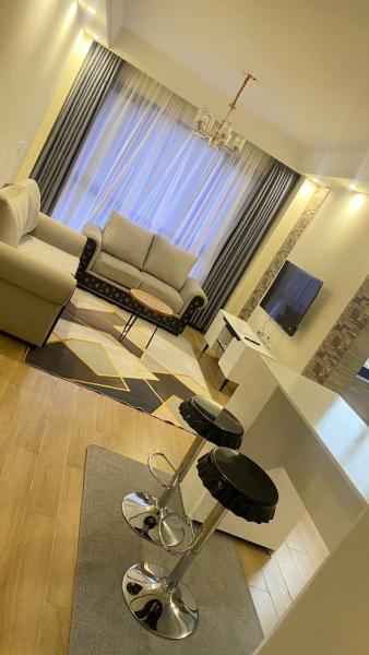 spacious executive one bedroom apartments with breathtaking city views swimming pool ,well equipped gym ,child playground and ample parking space, Rezervați Apartament Hoteluri în Nairobi cu parcare, Parcare